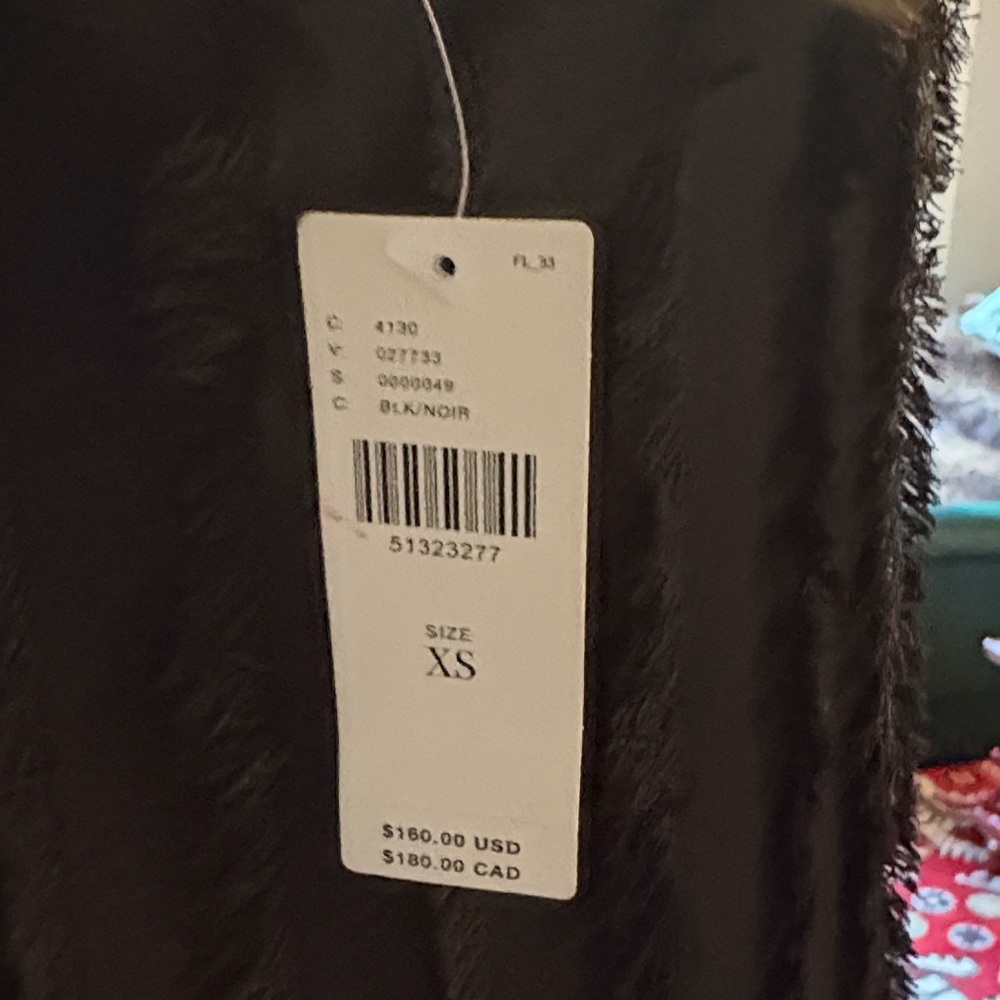 Anthropologie Black mini dress with texture and asymmetrical hen.Textured Skirt - Picture 3 of 12